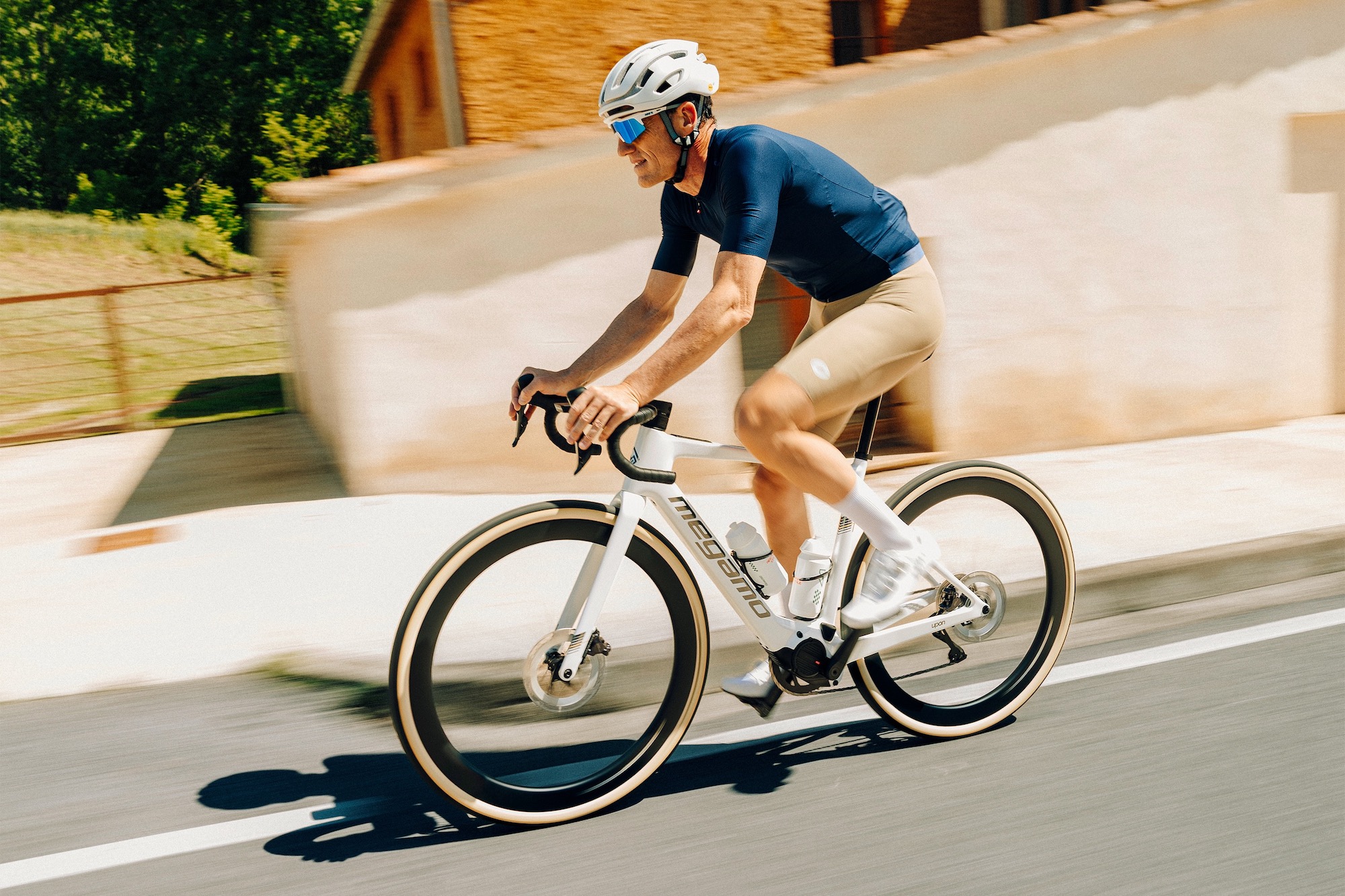 a man riding the Megamo Upon on the road.